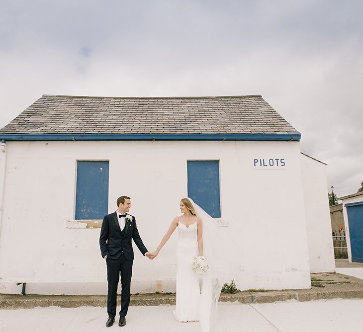 Bride in Enzoani Juri Bridal Gown | Groom in Black Tie | Elegant Black Tie Wedding with White Flowers at The Cleveland Tontine, North Yorkshire | Georgina Harrison Photography