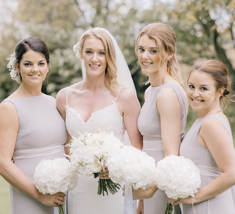 Bridal Party | Bridesmaids in Grey ASOS Dresses | Bride in Enzoani Juri Bridal Gown | Elegant Black Tie Wedding with White Flowers at The Cleveland Tontine, North Yorkshire | Georgina Harrison Photography