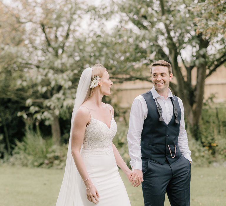 Bride in Enzoani Juri Bridal Gown | Groom in Black Tie | Elegant Black Tie Wedding with White Flowers at The Cleveland Tontine, North Yorkshire | Georgina Harrison Photography