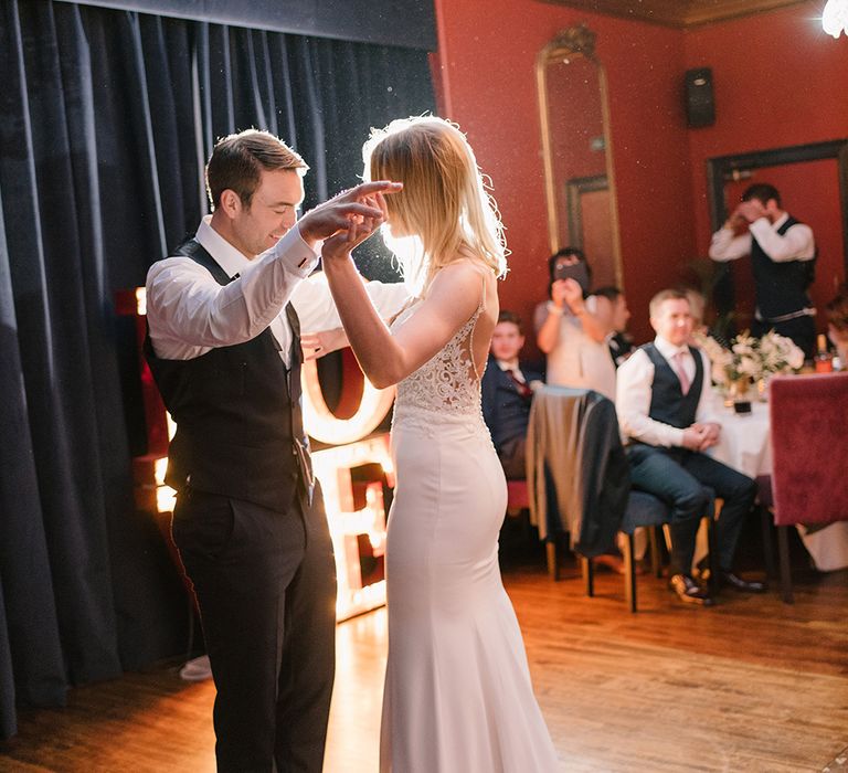 First Dance | Bride in Enzoani Juri Bridal Gown | Groom in Black Tie | Elegant Black Tie Wedding with White Flowers at The Cleveland Tontine, North Yorkshire | Georgina Harrison Photography