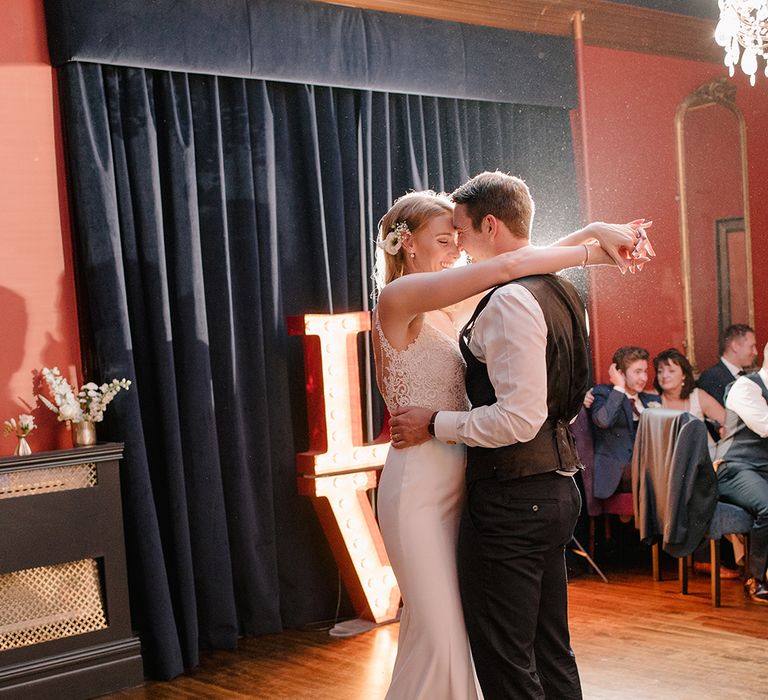 First Dance | Bride in Enzoani Juri Bridal Gown | Groom in Black Tie | Elegant Black Tie Wedding with White Flowers at The Cleveland Tontine, North Yorkshire | Georgina Harrison Photography