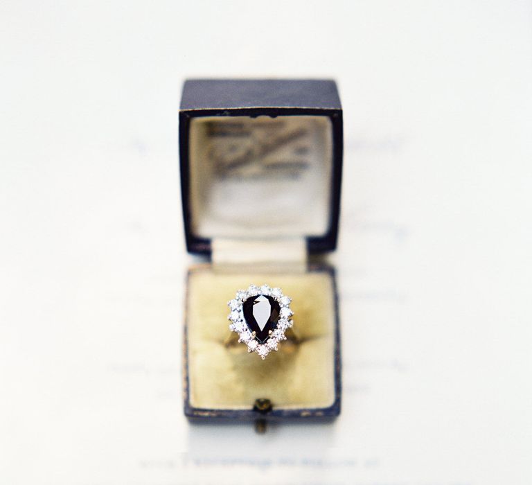 Vintage Teardrop Engagement Ring With Dark Stone // Image By Taylor And Porter