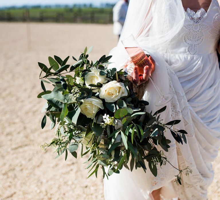 Oversized Wedding Bouquet With Greenery and White Flowers