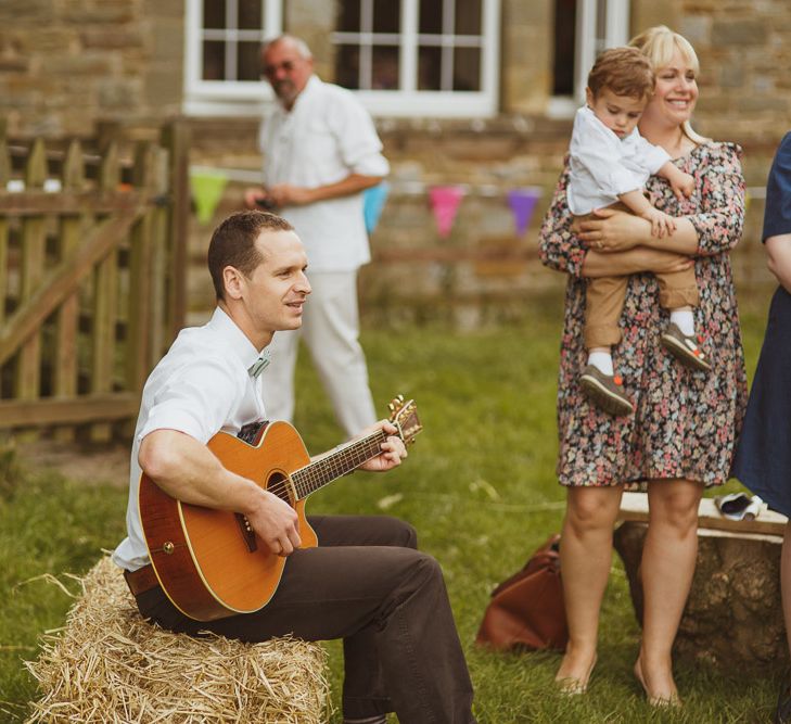 Hay Bale Seating For An Outdoor Wedding Ceremony