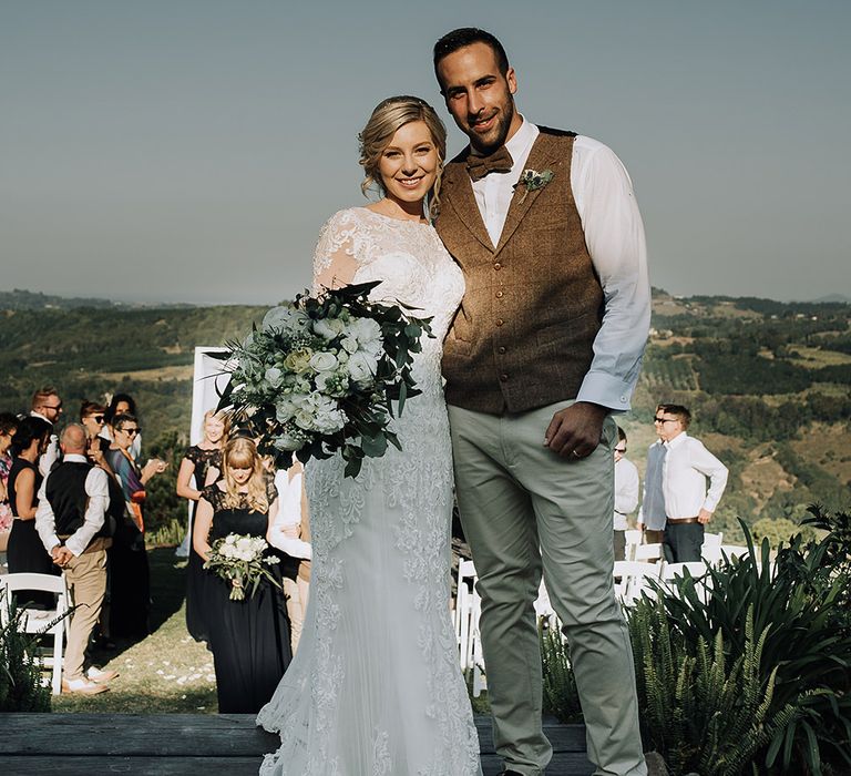 Bride in Lace Dress | Groom in Tweed Waistcoat & Chino's | Sophisticated White & Green Colour Scheme for an Outdoor Australian Wedding at Summer Grove | Photography & Film by Mad Rose Films