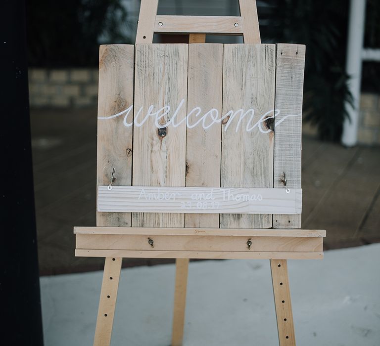 Wooden Welcome Sign | Sophisticated White & Green Colour Scheme for an Outdoor Australian Wedding at Summer Grove | Photography & Film by Mad Rose Films