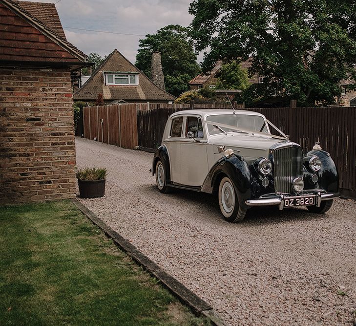 Bentley Wedding Car | White and Silver English Country Garden At Home Marquee Wedding | Jason Mark Harris Photography