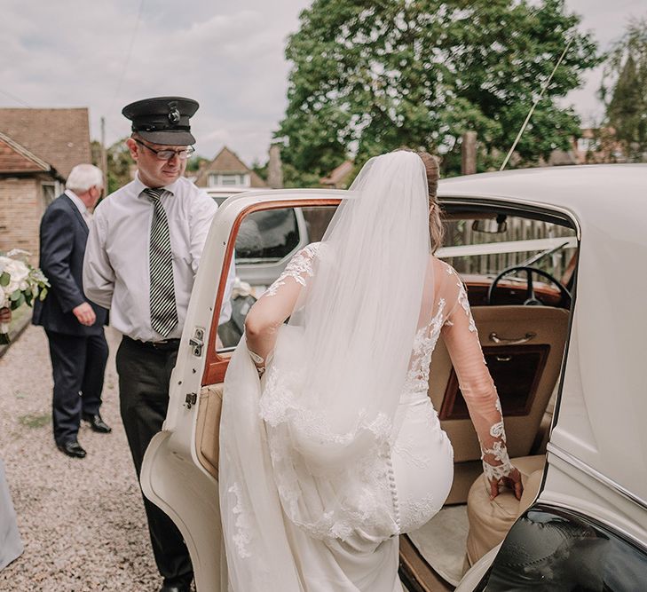 Bridal Entrance in Lace Pronovias Wedding Dress | White and Silver English Country Garden At Home Marquee Wedding | Jason Mark Harris Photography