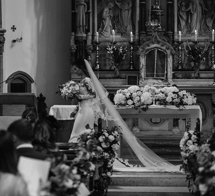 Church Wedding Ceremony | Bride in Lace Pronovias Bridal Gown | White and Silver English Country Garden At Home Marquee Wedding | Jason Mark Harris Photography