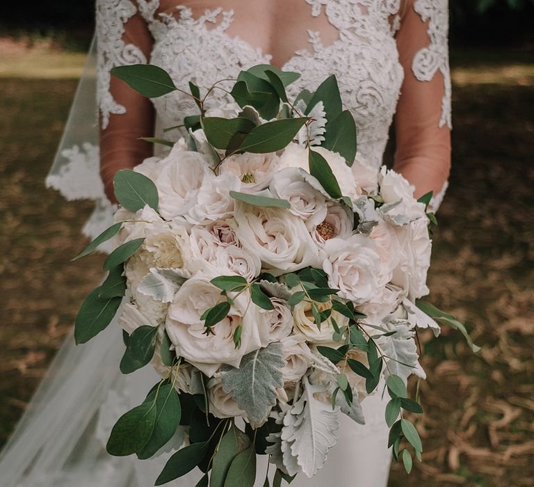 White Rose Wedding Bouquet | Bride in Lace Pronovias Bridal Gown | White and Silver English Country Garden At Home Marquee Wedding | Jason Mark Harris Photography