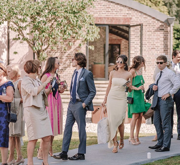 Wedding Guests | White and Silver English Country Garden At Home Marquee Wedding | Jason Mark Harris Photography