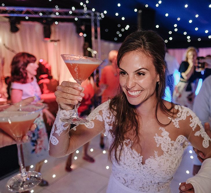 Bride in Lace Pronovias Bridal Gown | White and Silver English Country Garden At Home Marquee Wedding | Jason Mark Harris Photography