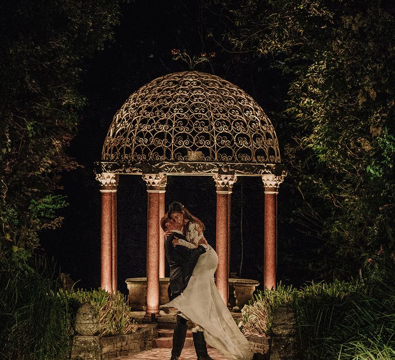 Bride in Lace Pronovias Bridal Gown | Groom in Thom Sweeney Suit | White and Silver English Country Garden At Home Marquee Wedding | Jason Mark Harris Photography