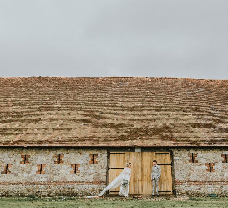 DIY Barn Wedding With Fairy Lights At The Great Barn Titchfield With Bride In Rolling In Roses Dress & Images From Joasis Photography