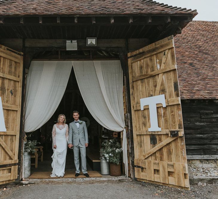 DIY Barn Wedding With Fairy Lights At The Great Barn Titchfield With Bride In Rolling In Roses Dress & Images From Joasis Photography