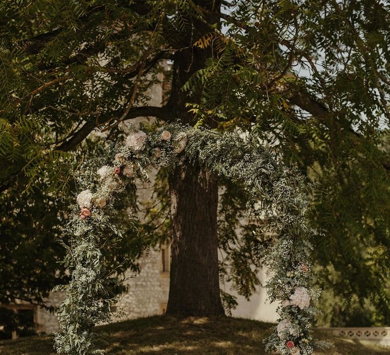 Floral Arch | Destination Wedding at Château de Saint Martory in France Planned by Senses Events | Danelle Bohane Photography | Matthias Guerin Films