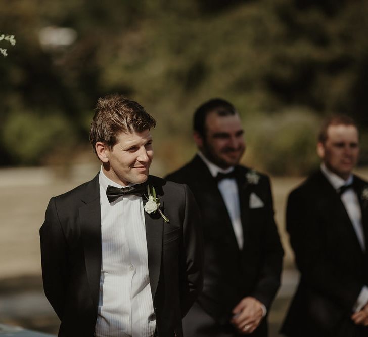 Groom in Paul Smith Black Tie Suit | Outdoor Destination Wedding at Château de Saint Martory in France Planned by Senses Events | Danelle Bohane Photography | Matthias Guerin Films