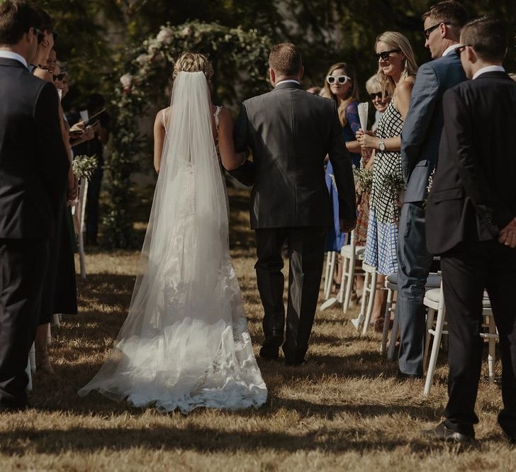 Bridal Entrance in Lace Stella York Gown | Outdoor Destination Wedding at Château de Saint Martory in France Planned by Senses Events | Danelle Bohane Photography | Matthias Guerin Films