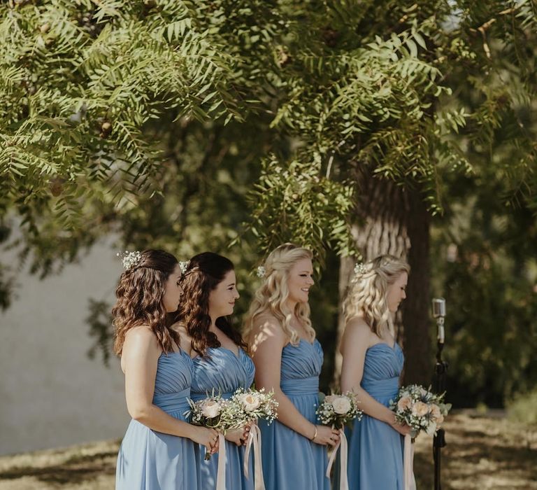 Bridesmaids in Blue Dessy Dresses | Outdoor Destination Wedding at Château de Saint Martory in France Planned by Senses Events | Danelle Bohane Photography | Matthias Guerin Films