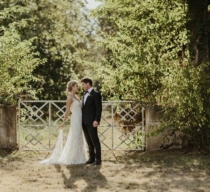 Bride in Lace Stella York Dress | Groom in Black Tie | Outdoor Destination Wedding at Château de Saint Martory in France Planned by Senses Events | Danelle Bohane Photography | Matthias Guerin Films