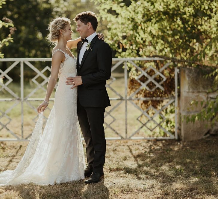 Bride in Lace Stella York Dress | Groom in Black Tie | Outdoor Destination Wedding at Château de Saint Martory in France Planned by Senses Events | Danelle Bohane Photography | Matthias Guerin Films