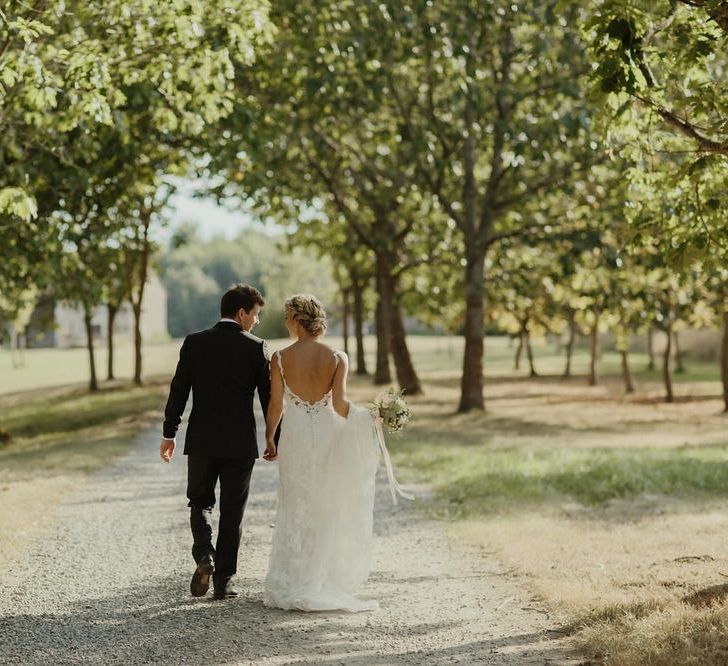 Bride in Lace Stella York Dress | Groom in Black Tie | Outdoor Destination Wedding at Château de Saint Martory in France Planned by Senses Events | Danelle Bohane Photography | Matthias Guerin Films