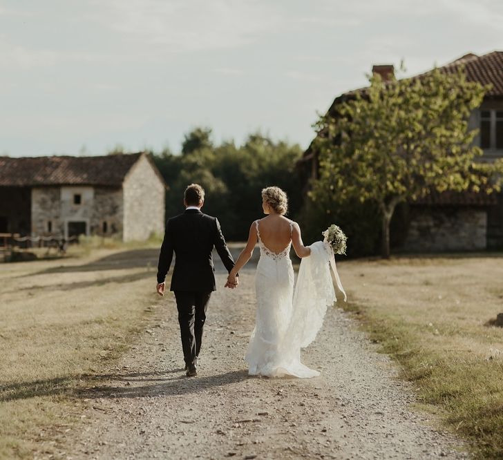 Bride in Lace Stella York Dress | Groom in Black Tie | Outdoor Destination Wedding at Château de Saint Martory in France Planned by Senses Events | Danelle Bohane Photography | Matthias Guerin Films