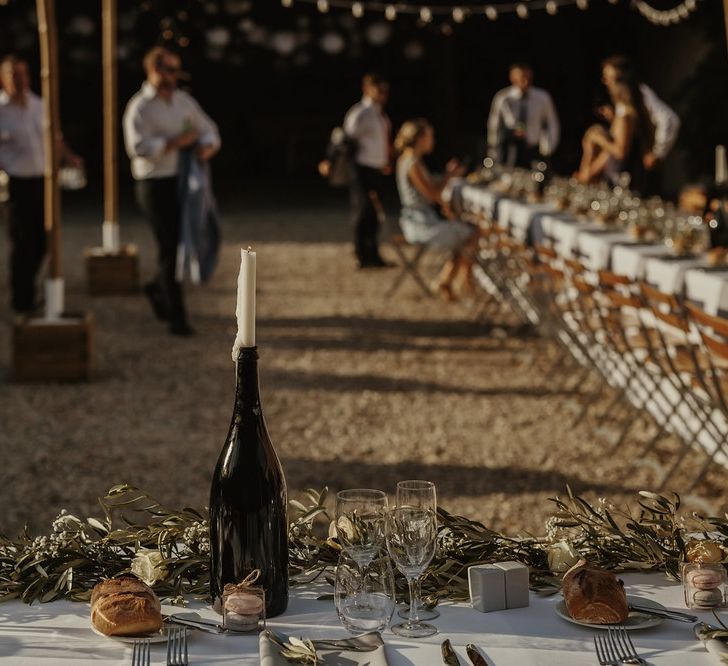 Bottle & Candle Table Decor | Outdoor Destination Wedding at Château de Saint Martory in France Planned by Senses Events | Danelle Bohane Photography | Matthias Guerin Films