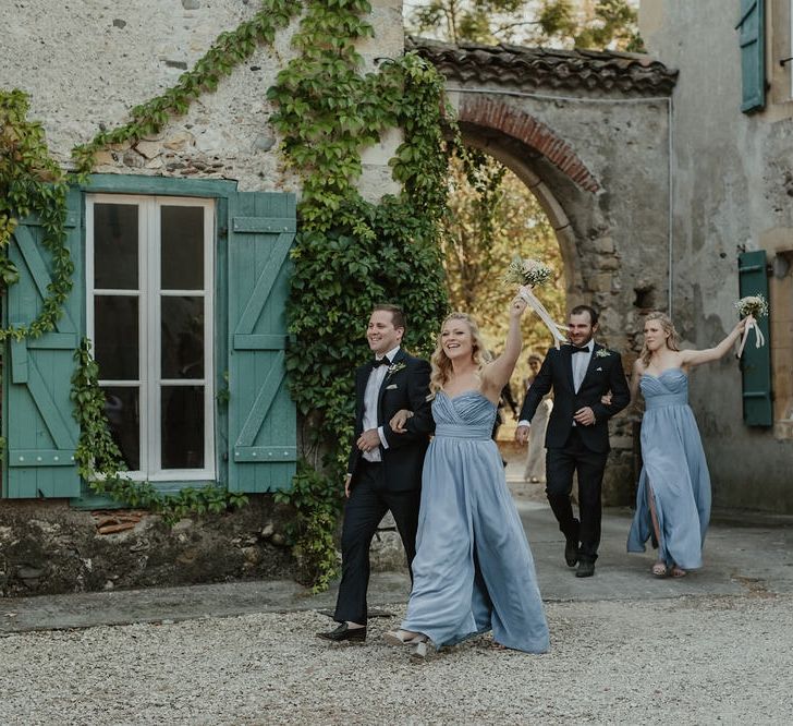 Wedding Party Entrance | Outdoor Destination Wedding at Château de Saint Martory in France Planned by Senses Events | Danelle Bohane Photography | Matthias Guerin Films