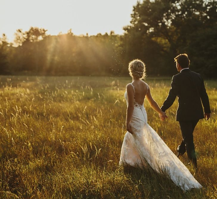 Golden Hour | Bride in Lace Stella York Dress | Groom in Black Tie | Outdoor Destination Wedding at Château de Saint Martory in France Planned by Senses Events | Danelle Bohane Photography | Matthias Guerin Films