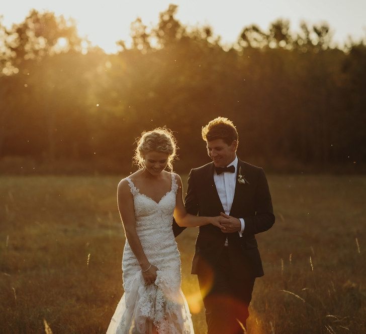 Golden Hour | Bride in Lace Stella York Dress | Groom in Black Tie | Outdoor Destination Wedding at Château de Saint Martory in France Planned by Senses Events | Danelle Bohane Photography | Matthias Guerin Films