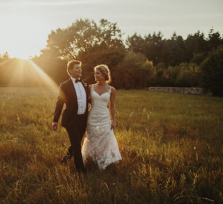 Golden Hour | Bride in Lace Stella York Dress | Groom in Black Tie | Outdoor Destination Wedding at Château de Saint Martory in France Planned by Senses Events | Danelle Bohane Photography | Matthias Guerin Films