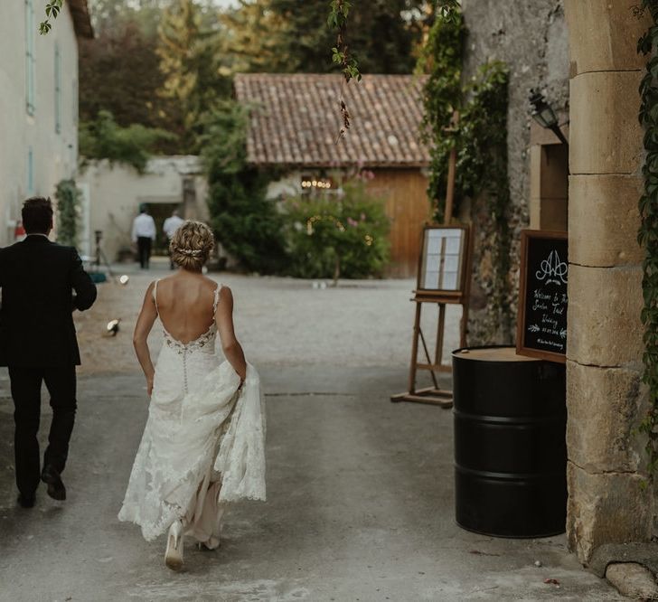 Bride in Lace Stella York Dress | Groom in Black Tie | Outdoor Destination Wedding at Château de Saint Martory in France Planned by Senses Events | Danelle Bohane Photography | Matthias Guerin Films