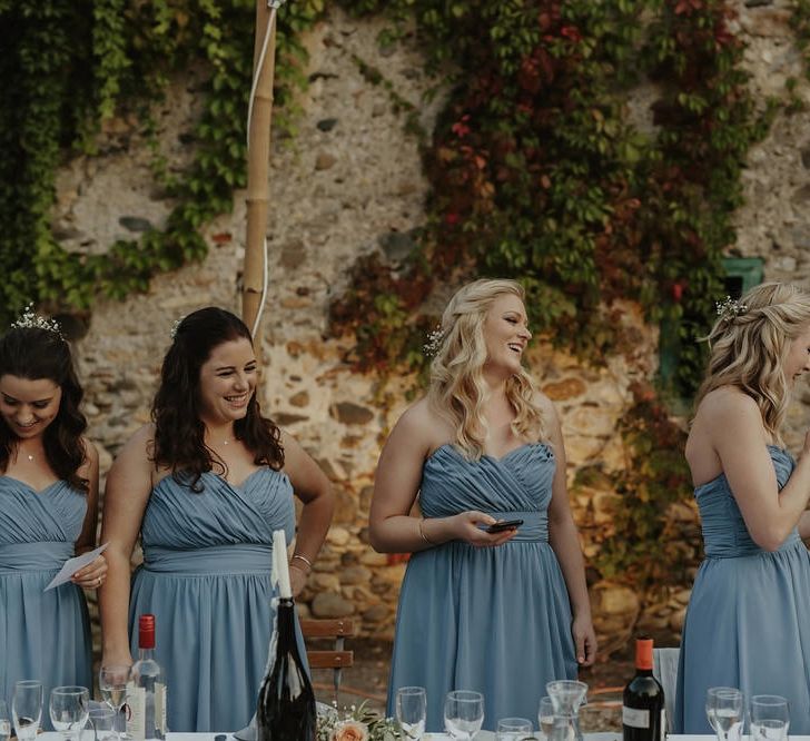 Bridesmaids in Blue Dessy Dresses | Outdoor Destination Wedding at Château de Saint Martory in France Planned by Senses Events | Danelle Bohane Photography | Matthias Guerin Films