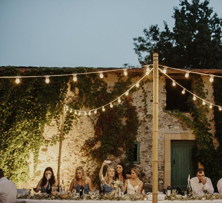 Al Fresco Reception with Festoon Lights | Outdoor Destination Wedding at Château de Saint Martory in France Planned by Senses Events | Danelle Bohane Photography | Matthias Guerin Films