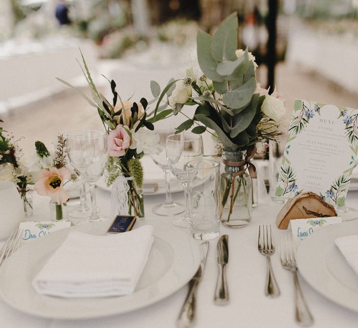 Wedding Table Scape With Cream Linen And Pink Jam Jar Flowers