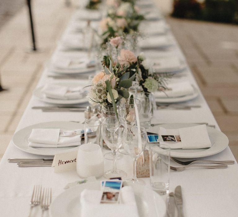 Wedding Table Scape With Cream Linen And Pink Jam Jar Flowers