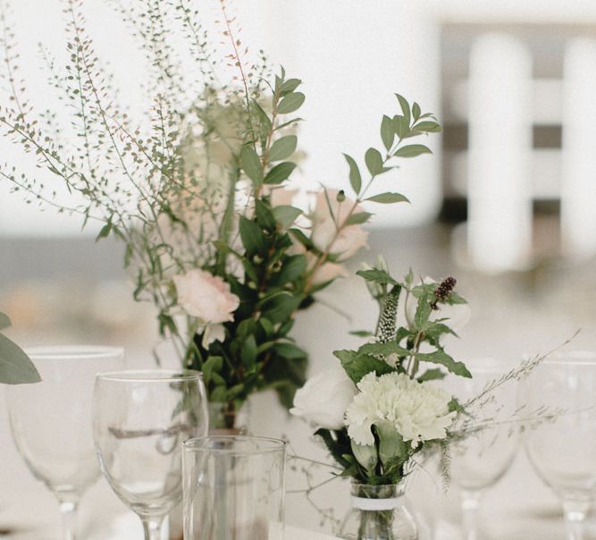 Wedding Table Scape With Cream Linen And Pink Jam Jar Flowers