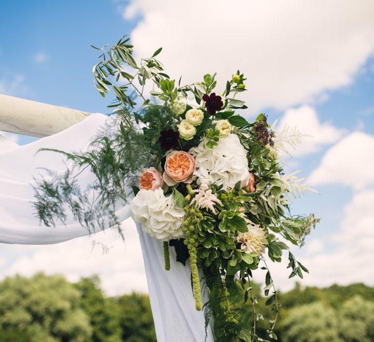 Draped Wedding Altar with Peach Flowers