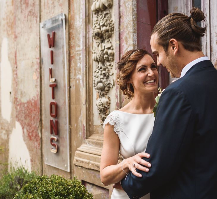 Wiltons Music Hall Wedding With Bride In Paloma Blanca And Bridesmaids In Sequinned Adrianna Papell Gowns Images By Jackson & Co Photography