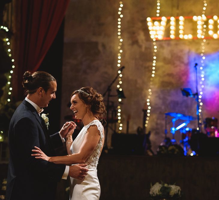 Wiltons Music Hall Wedding With Bride In Paloma Blanca And Bridesmaids In Sequinned Adrianna Papell Gowns Images By Jackson & Co Photography