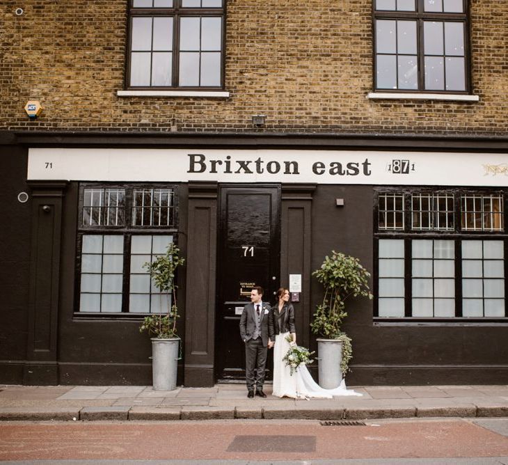 Bride In Leather Jacket | Wedding Reception At Brixton East | Image by Ellie Gillard Photography