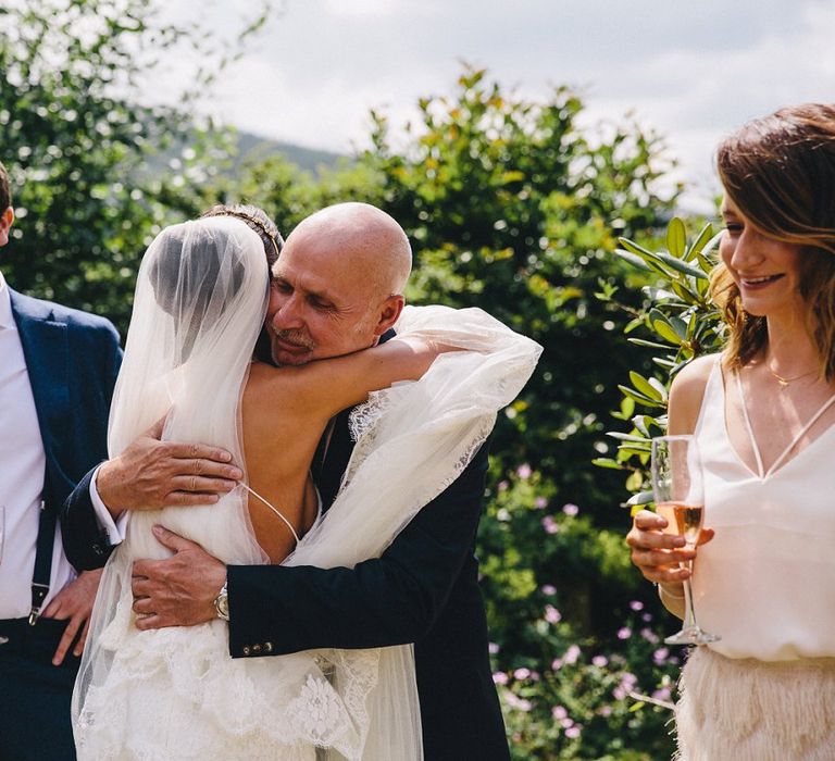 Father of the Bride hugs