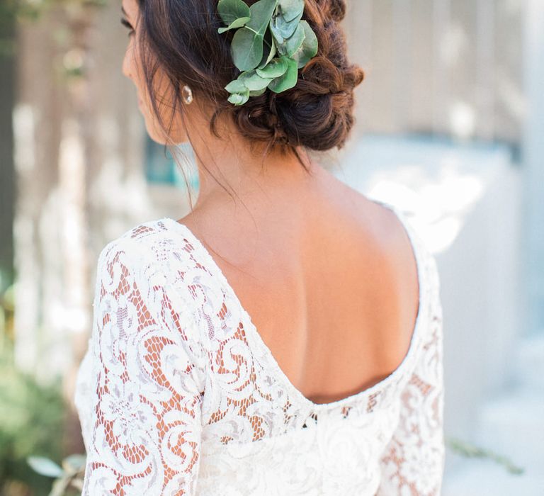 Chic Bridal Up Do with Eucalyptus Leaves in her Hair