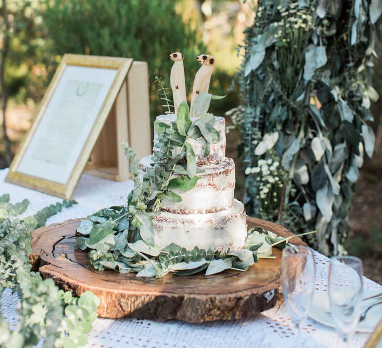 Semi Naked Wedding Cake with Meerkat Cake Topper