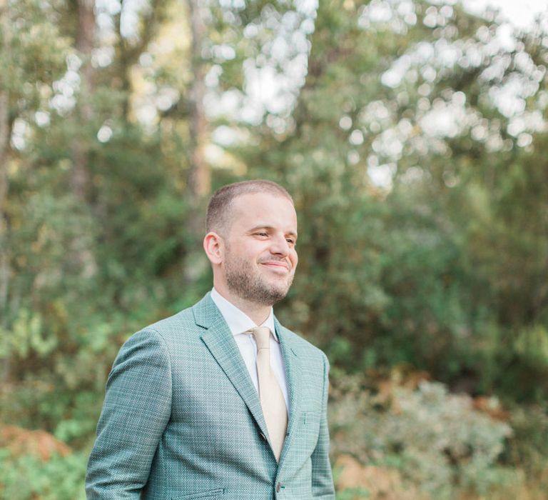 Groom in Non Public Wedding Suit