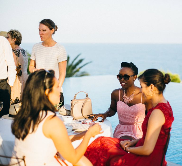 Wedding Guests around Infinity Pool at Casa del Mar Spanish Villa