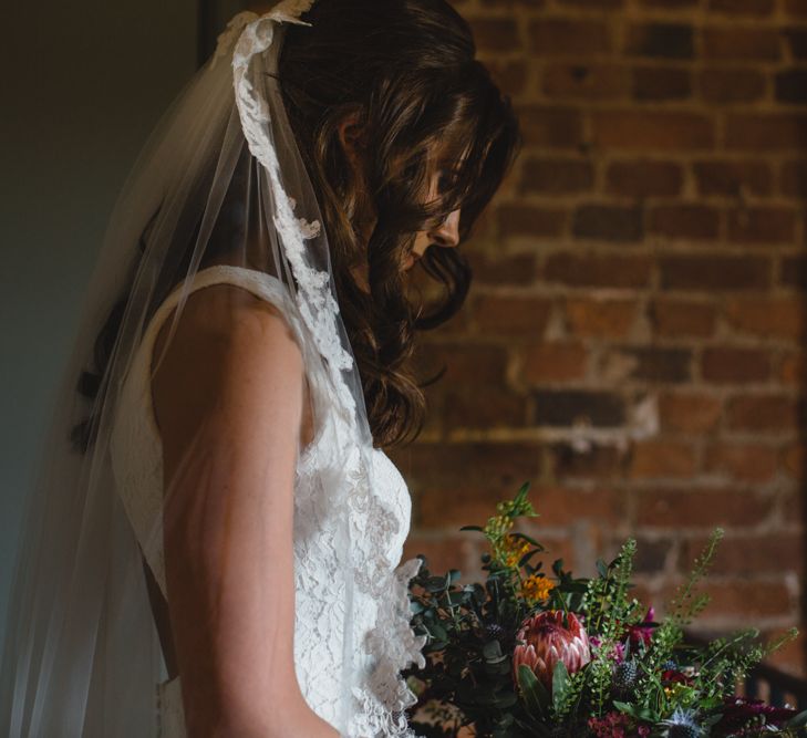 Bride in Pronovias Ornani Bridal Gown & Veil | Industrial Wedding at The West Mill Venue | Sarah Gray Photography