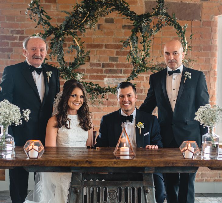 Bride in Pronovias Ornani Bridal Gown & Veil | Groom in Charles Tyrwitt Midnight Blue Tuxedo | Industrial Wedding at The West Mill Venue | Sarah Gray Photography