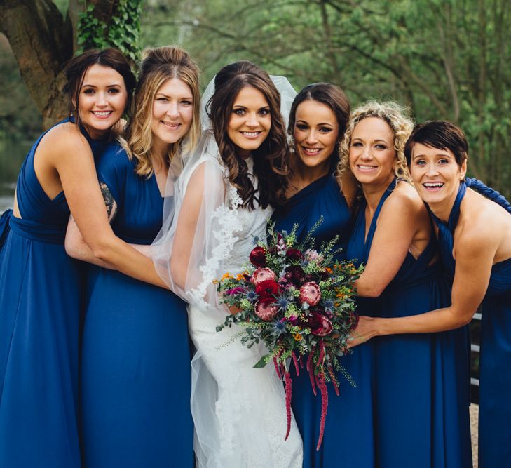 Bridesmaids in Midnight Blue Multiway Dresses | Industrial Wedding at The West Mill Venue | Sarah Gray Photography